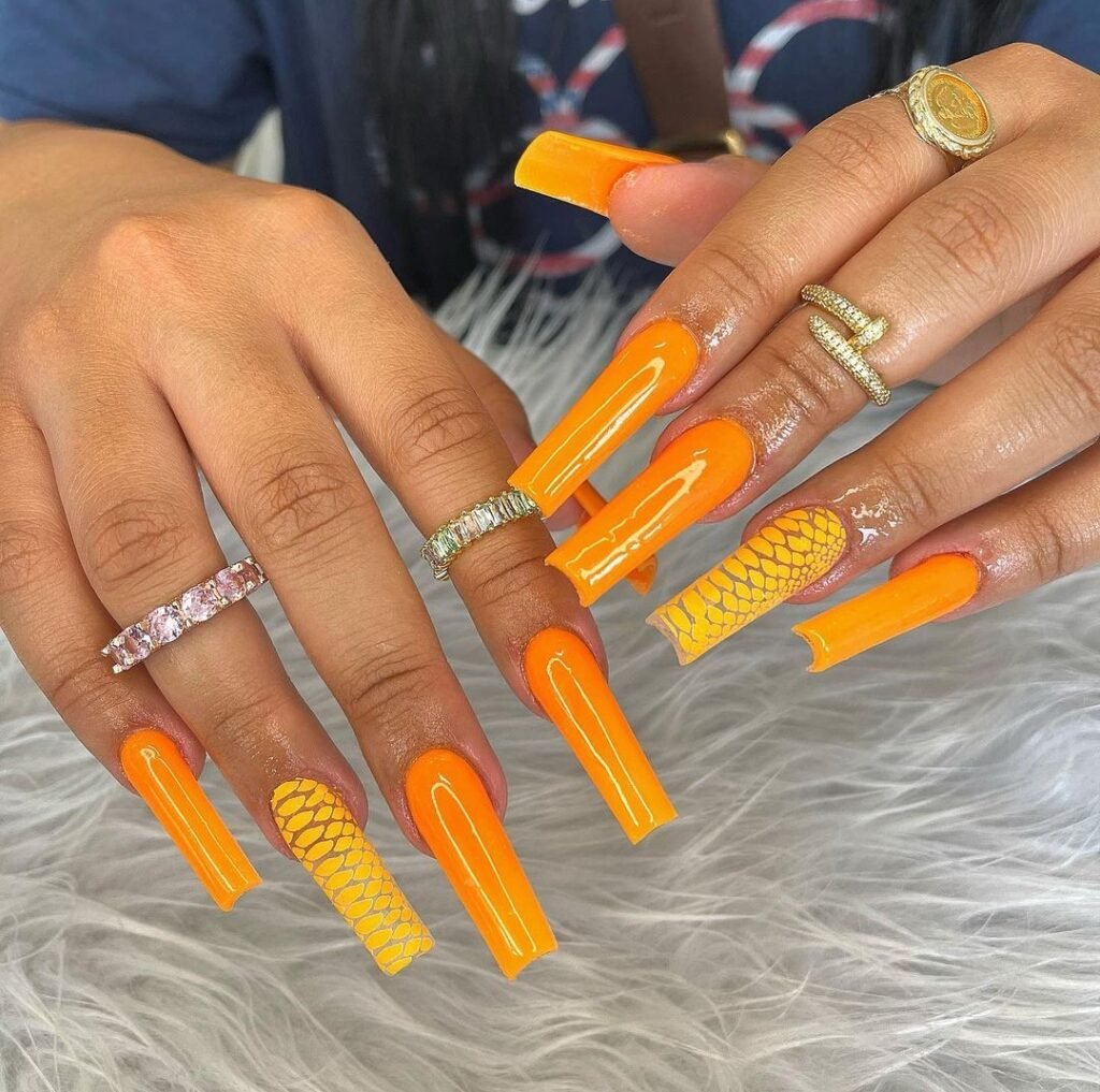 Orange color long nails design idea