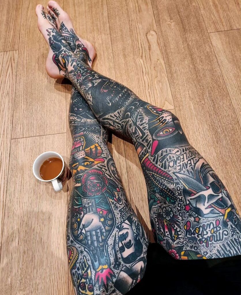 women's thigh tattoo