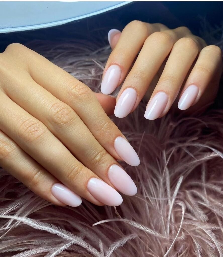 Glossy light pink nails