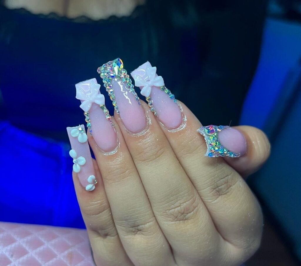 light pink nails with glitter design