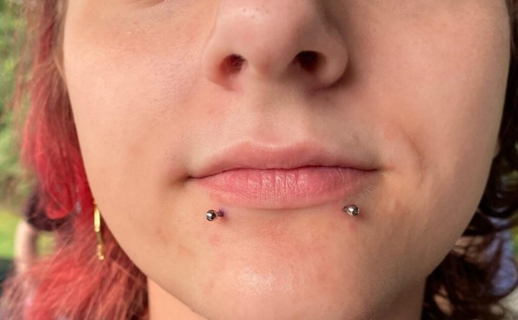 Snake bite piercing female