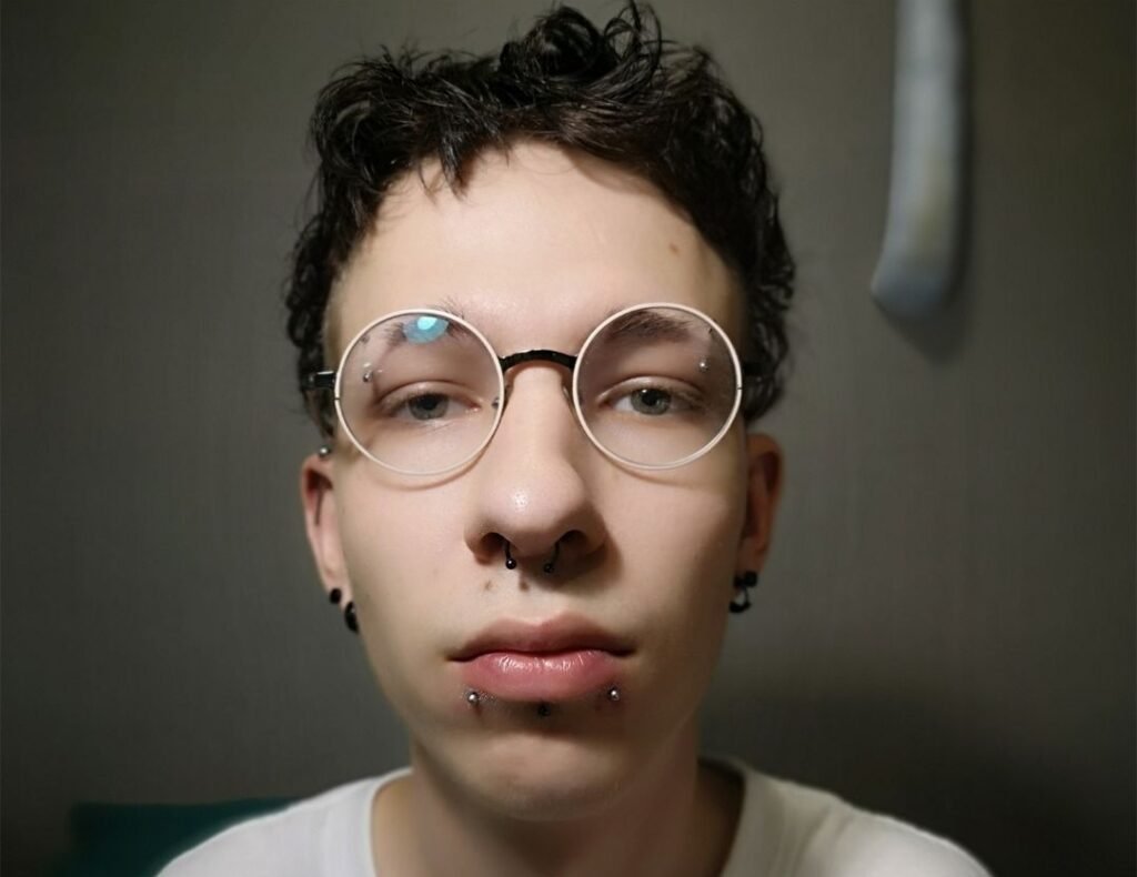 Snake bite piercing male