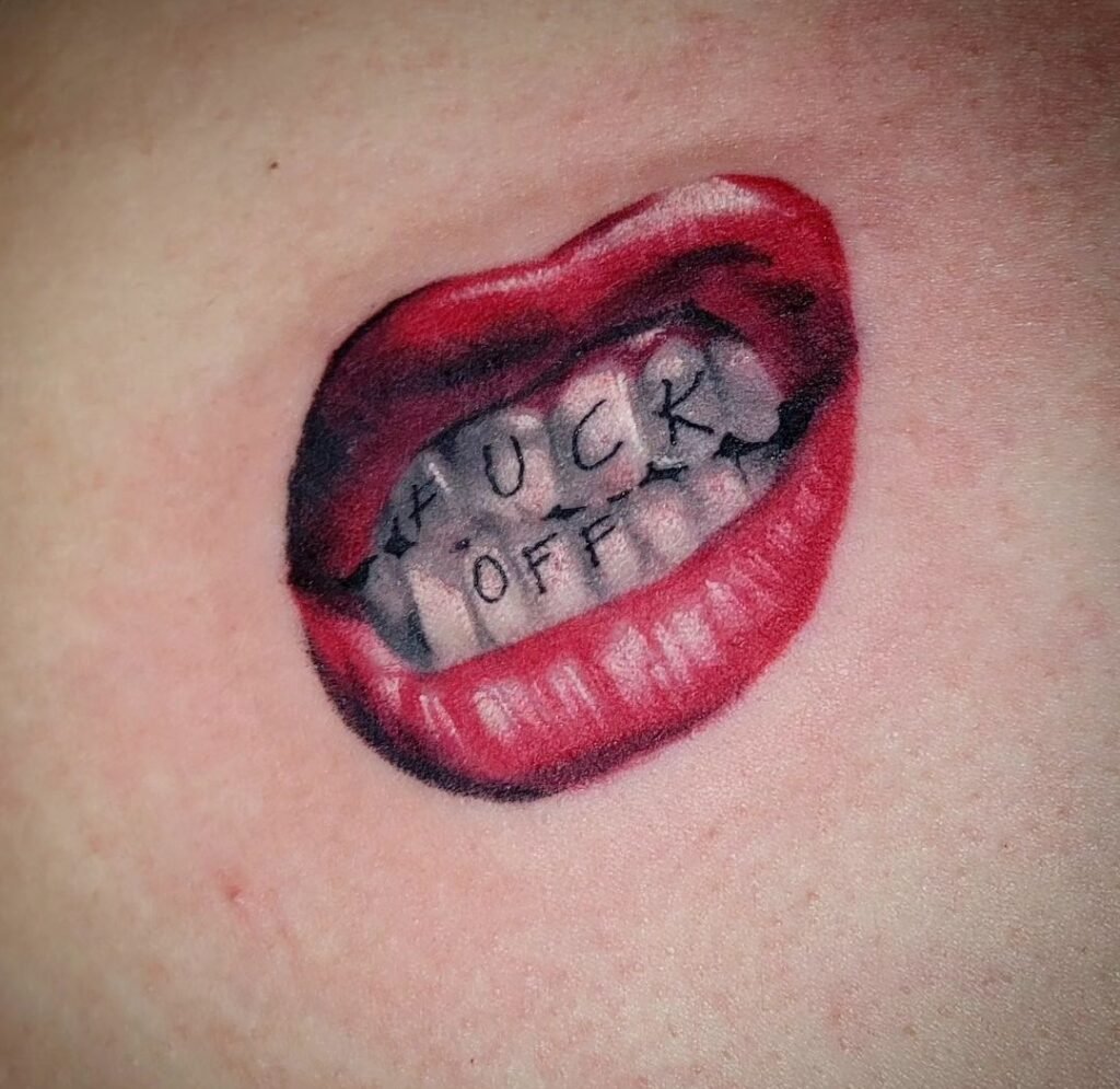 tattoos lips on hand